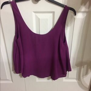 Shinestar purple sleeveless blouse.